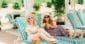 Two women on lounge chairs