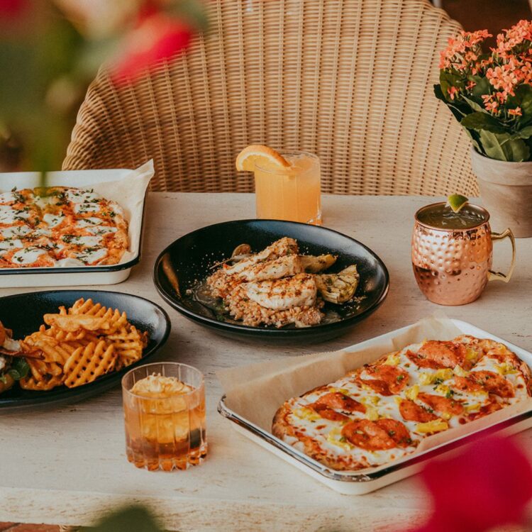 A table set with various dishes and drinks